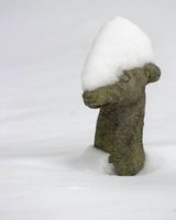 Statuary Dog Buried in Snow